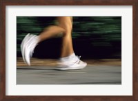 Low Section View Of A Person Running In White Sneakers Fine Art Print