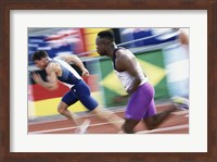 Side profile of two young men running on a running track Fine Art Print