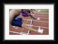 Side profile of three people jumping a hurdle Fine Art Print