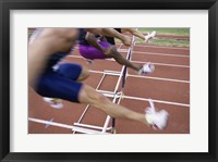 Side profile of three people jumping a hurdle Fine Art Print