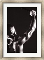 Male runner holding up a relay baton Fine Art Print