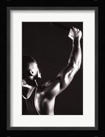 Male runner holding up a relay baton Fine Art Print