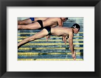 Side profile of three swimmers jumping into a swimming pool Fine Art Print