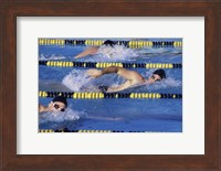 Three swimmers racing in a swimming pool Fine Art Print