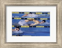 Three swimmers racing in a swimming pool Fine Art Print