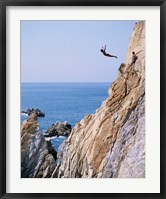 Male cliff diver jumping off a cliff, La Quebrada, Acapulco, Mexico Fine Art Print