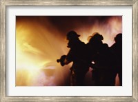 Firefighters extinguishing a fire Fine Art Print