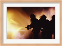 Firefighters extinguishing a fire Fine Art Print