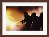 Firefighters extinguishing a fire Fine Art Print