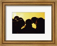 Rear view of a group of firefighters looking down Fine Art Print