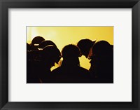 Rear view of a group of firefighters looking down Fine Art Print