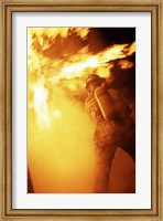 Fireman fighting with fire flames Fine Art Print