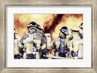 Rear view of a group of firefighters holding water hoses Fine Art Print