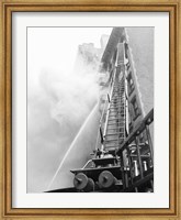 Fire engine with ladder up burning building Fine Art Print