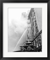 Fire engine with ladder up burning building Fine Art Print