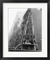Fire engine with ladder up burning building Fine Art Print