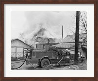 Fire engine next to home in fire Fine Art Print
