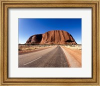 Road passing through a landscape, Ayers Rock, Uluru-Kata Tjuta National Park, Australia Fine Art Print