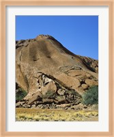 Tourists climbing on a rock, Ayers Rock, Uluru-Kata Tjuta National Park, Australia Fine Art Print