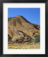Tourists climbing on a rock, Ayers Rock, Uluru-Kata Tjuta National Park, Australia Fine Art Print