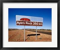 Distance sign on the road side, Ayers Rock, Uluru-Kata Tjuta National Park, Australia Fine Art Print