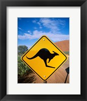 Kangaroo sign on a road with a rock formation in the background, Ayers Rock Fine Art Print
