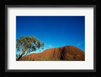 Rock formation on a landscape, Ayers Rock, Uluru-Kata Tjuta National Park, Northern Territory, Australia Fine Art Print