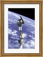 Astronaut Repairing Module Fine Art Print