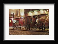 Bicycles parked in front of a restaurant at night, Dublin, Ireland Fine Art Print