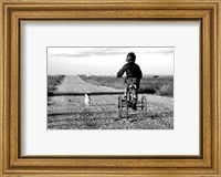 Rear view of a girl riding a bicycle Fine Art Print