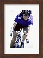 Young woman riding a bicycle Fine Art Print
