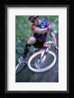 Young man on a bicycle Framed Print
