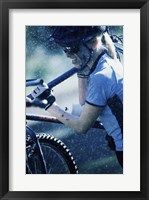 Young woman carrying a bicycle on her shoulders Fine Art Print