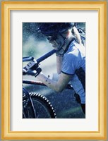 Young woman carrying a bicycle on her shoulders Fine Art Print