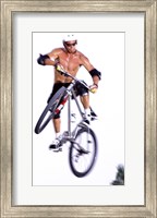 Young man on a bicycle in mid-air Fine Art Print