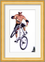 Young man on a bicycle in mid-air Fine Art Print