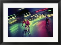 Young man riding a bicycle Fine Art Print