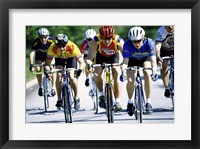 Group of cyclists riding bicycles Framed Print