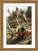 Young man falling off his bicycle in a race Fine Art Print