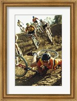 Young man falling off his bicycle in a race Fine Art Print