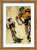 Group of people riding bicycles in a race Fine Art Print