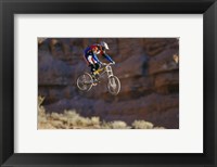 Side profile of a person on a bicycle in mid air Fine Art Print
