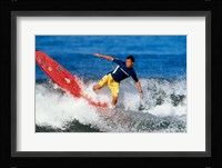Surfing in the water Framed Print