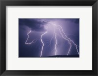 Lightning bolts striking the earth Fine Art Print