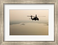 An Air Force helicopter flys over Lake Pontchatrain to New Orleans Fine Art Print