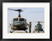 Iraqi air force carries wounded warrior on aeromedical evacuation mission Framed Print