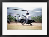 Three AH-1 Cobra gunship helicopters Fine Art Print
