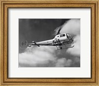 Low angle view of a helicopter in flight in the sky, Bell Helicopter Fine Art Print