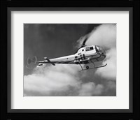 Low angle view of a helicopter in flight in the sky, Bell Helicopter Fine Art Print