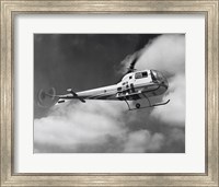 Low angle view of a helicopter in flight in the sky, Bell Helicopter Fine Art Print